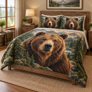 Brown Bear Mountain Forest Quilt Set on a bed, angled view showing the quilt design and two coordinating pillow shams