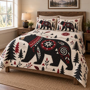 Nordic Black Bear Forest Quilt Set on a bed, angled view showing the quilt design and two coordinating pillow shams