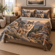 Mountain Wolf Sunset Forest Quilt Set on a bed, angled view showing the quilt design and two coordinating pillow shams