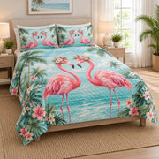 Romantic Flamingo Tropical Love Quilt Set on a bed, angled view showing the quilt design and two coordinating pillow shams