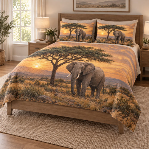 African Elephant Savanna Sunset Quilt Set on a bed, angled view showing the quilt design and two coordinating pillow shams
