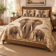 Vintage Elephant Family Safari Quilt Set on a bed, angled view showing the quilt design and two coordinating pillow shams
