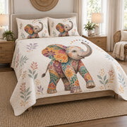 Boho Colorful Elephant Floral Quilt Set on a bed, angled view showing the quilt design and two coordinating pillow shams