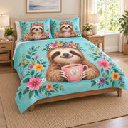 Cute Sloth Coffee Floral Quilt Set on a bed, angled view showing the quilt design and two coordinating pillow shams