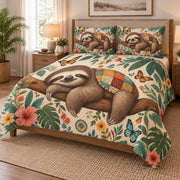 Sleeping Sloth Butterfly Floral Quilt Set on a bed, angled view showing the quilt design and two coordinating pillow shams