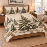 Snowy Christmas Tree Forest Quilt Set on a bed, angled view showing the quilt design and two coordinating pillow shams