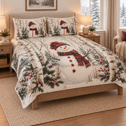 Christmas Snowman Birch Forest Quilt Set on a bed, angled view showing the quilt design and two coordinating pillow shams