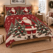 Santa Claus Christmas Tree Quilt Set on a bed, angled view showing the quilt design and two coordinating pillow shams