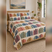 Muted Rainbow Bookshelf Quilt Set, angled book collecting bedroom view