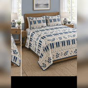 Indigo Piano Block Print Quilt Set, angled piano bedroom view