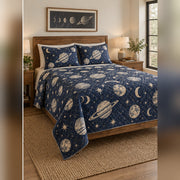 Indigo Planet Block Print Quilt Set, angled planetary science bedroom view