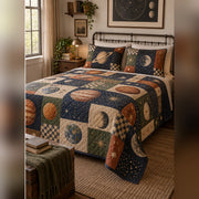 Heirloom Planetary Patchwork Print Quilt Set, angled planetary science bedroom view