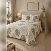 Minimal Monstera Line Art Quilt Set, angled monstera leaf bedroom view