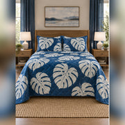 Indigo Monstera Cyanotype Quilt Set, front monstera leaf bedroom view