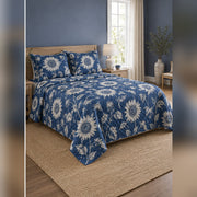 Indigo Sunflower Cyanotype Quilt Set, angled sunflower bedroom view