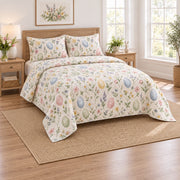 Painted Egg Meadow Easter Quilt Set, angled easter home decorating bedroom view