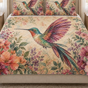 Close view of the Hummingbird Floral Garden quilt artwork and two matching shams