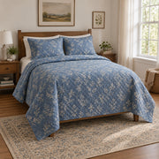Blue Botanical Embroidery Quilt Set, angled embroidery bedroom view