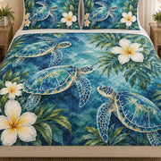Close view of the Sea Turtle Tropical Floral quilt artwork and two matching shams
