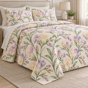 Pastel Freesia Sprays quilt set, left, AI-generated mockup