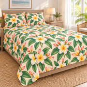Island Plumeria Breeze quilt set, left, AI-generated mockup