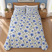 Cornflower Indigo Meadow quilt set, 04-overhead, AI-generated mockup