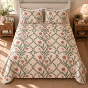 Tulip Cottage Garden Trellis quilt set, overhead view, AI-generated mockup with diamond quilting
