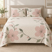 Cherry Blossom Quiet Line Bloom quilt set, front view, AI-generated mockup with diamond quilting