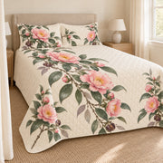 Pink camellia sasanqua quilt set left angle with printed shams
