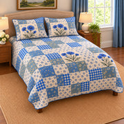 Cornflower patchwork quilt set, left view, AI-generated digital product mockup