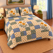 Golden yellow cosmos patchwork quilt set, left view, AI-generated digital product mockup