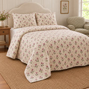 Red Clover ditsy garden floral quilt set, left angle view