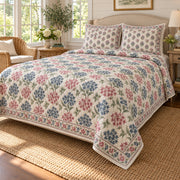 Pentas Hand Block Floral Rhythm quilt set, right oblique angle, AI generated mockup