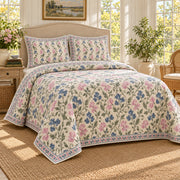 Sweet Pea Hand Block Floral Rhythm quilt set, left angle, AI generated mockup