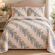 California lilac quilt set, front view with trailing blue flower garlands and diamond stitching, AI-generated mockup
