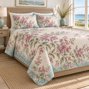 Crape Myrtle coastal sea glass quilt set, left oblique view, matching watercolor floral print and diamond quilting, AI-generated mockup
