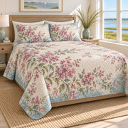 Crape Myrtle coastal sea glass quilt set, alternate bedroom view, matching watercolor floral print and diamond quilting, AI-generated mockup