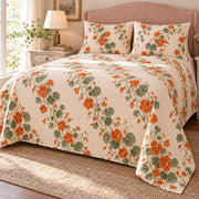 Nasturtium trailing garland quilt set, front bedroom view, orange flowers without decorative border and with diamond quilting, AI-generated mockup