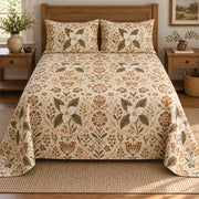 Trillium folk art garden quilt set, centered elevated direct view with diamond quilting, AI-generated mockup