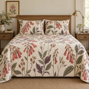 Cape fuchsia heirloom herbarium quilt set, centered front cottage bedroom view with diamond quilting, AI-generated mockup