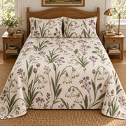 Summer snowflake heirloom herbarium quilt set, centered elevated direct view with diamond quilting, AI-generated mockup