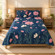 Cosmos Moonlit floral quilt set in navy, front view, AI-generated product preview