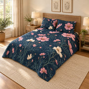 Cosmos Moonlit floral quilt set in navy, left view, AI-generated product preview