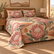 King Protea terracotta quilt set, low left bedroom view with diamond quilting, AI-generated mockup