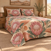 King Protea terracotta quilt set, low right bedroom view with diamond quilting, AI-generated mockup
