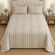 Strawflower botanical stripe quilt set, centered elevated direct view with diamond quilting, AI-generated mockup