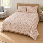 AI-generated mockup, pulled-back front-right view showing the opposite side of the Celosia quilt set.