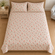 AI-generated mockup, high directly frontal near-overhead view of Celosia quilt set and two printed pillows.