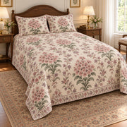 AI-generated mockup, pulled-back front-left view of Garden Phlox quilt set with printed border and diamond quilting.