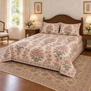 AI-generated mockup, pulled-back front-right view showing the opposite side of the Garden Phlox quilt set.